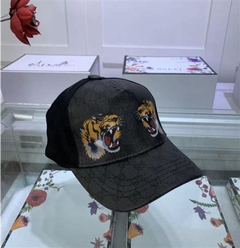 casquette gucci lion noir|gucci bucket hat.